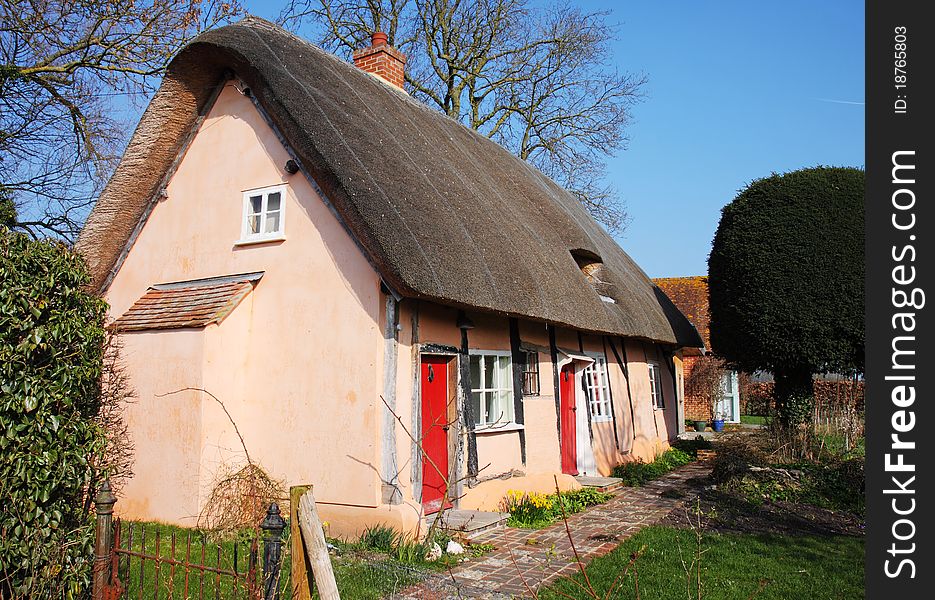 Thatched Village Cottage Rendered In Pink