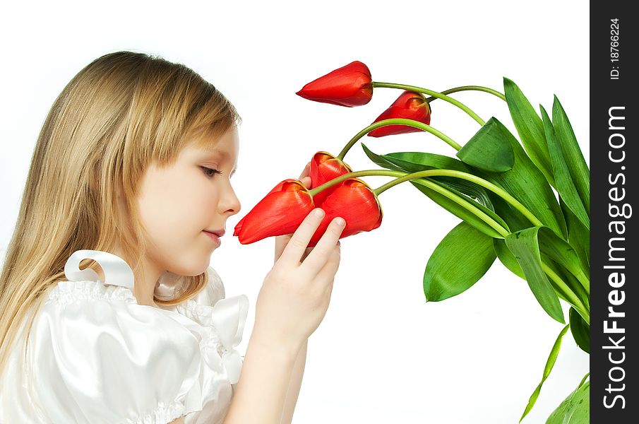 Cute little girl with red flowers on white. Cute little girl with red flowers on white