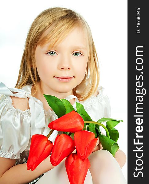 Cute little girl with red flowers on white. Cute little girl with red flowers on white