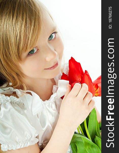 Cute little girl with red flowers on white. Cute little girl with red flowers on white