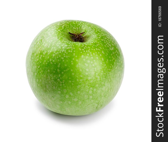 Ripe and juicy green apple a shank downwards isolated on a white background