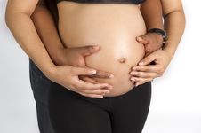 Sexy Beautiful Pregnant Couple Hands On Stomach Stock Photography