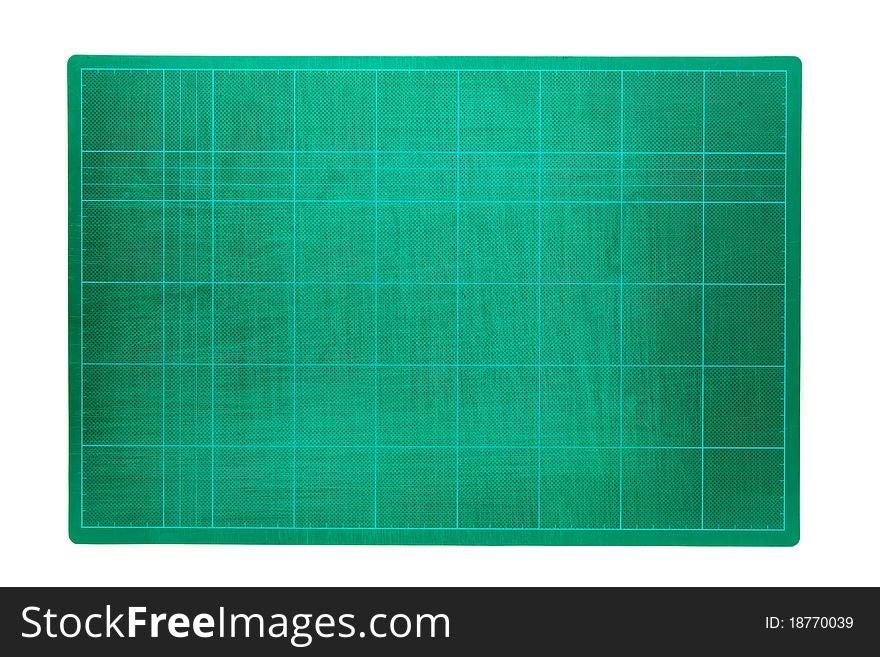 Green cutting mats on a white background.