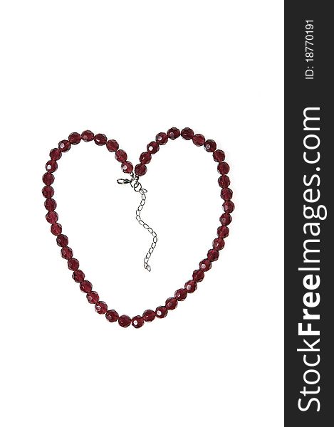 Form of heart from Beads on white background