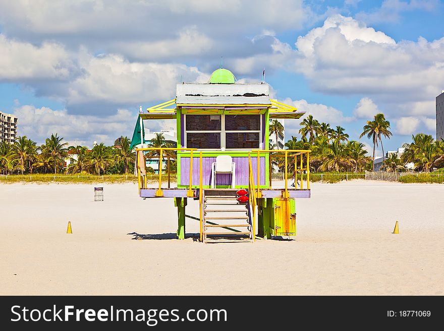 Wooden colorful beach watch hut at the beautiful white beach. Wooden colorful beach watch hut at the beautiful white beach