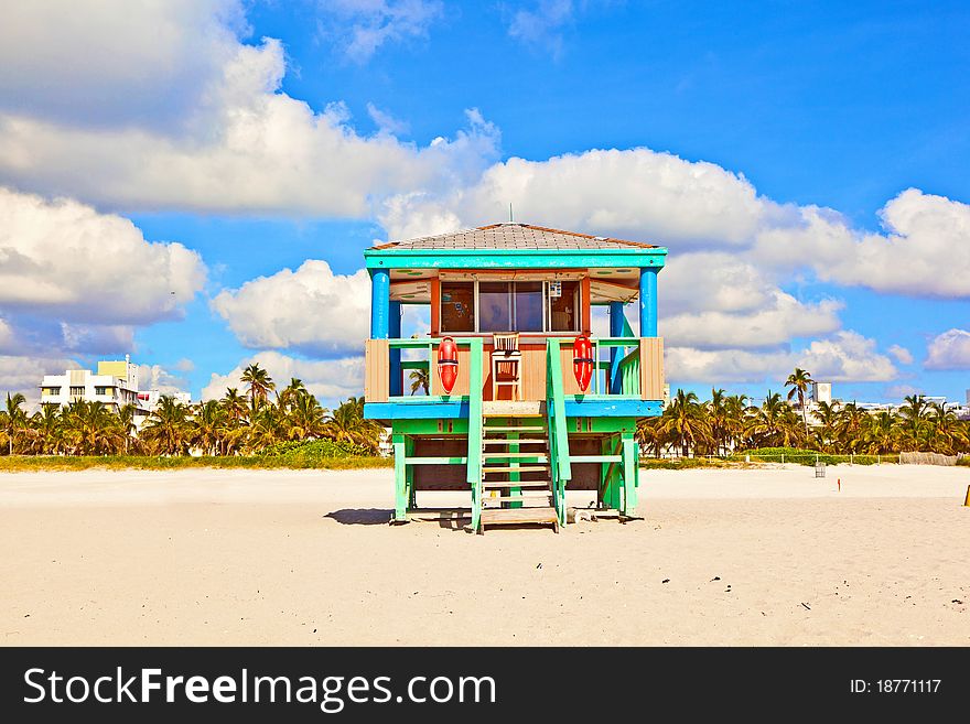 Wooden colorful beach watch hut at the beautiful white beach. Wooden colorful beach watch hut at the beautiful white beach