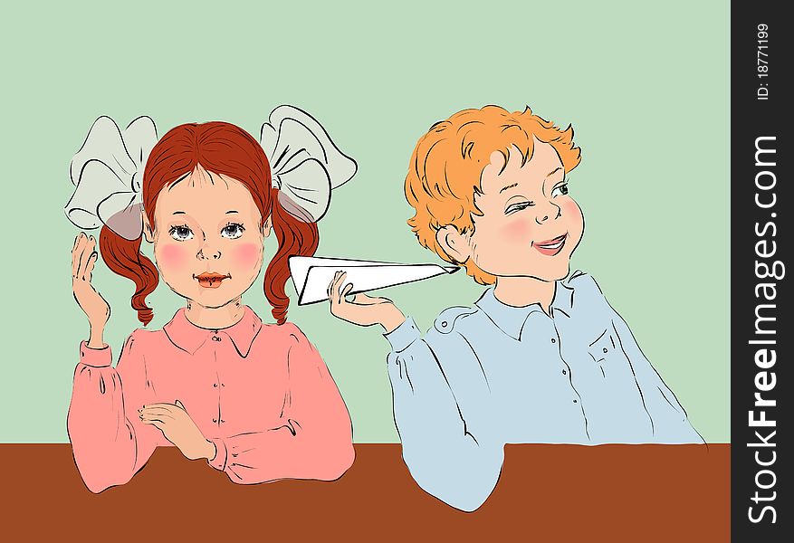 Girl and boy behind a school desk on a lesson. Girl and boy behind a school desk on a lesson