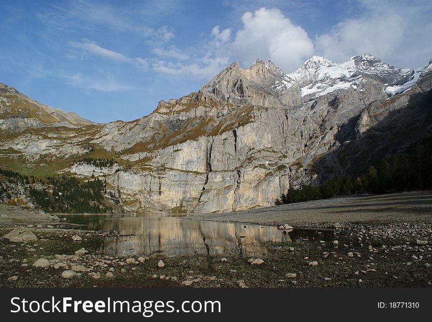 The Alpine lake, the Swiss landscape, the Alpine meadow