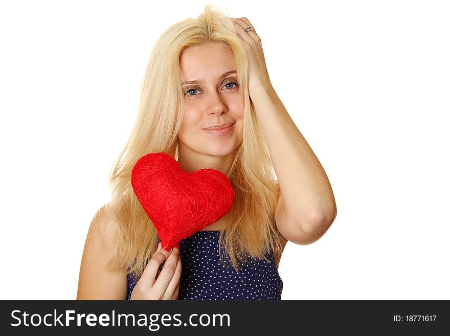 Young woman holding red heart