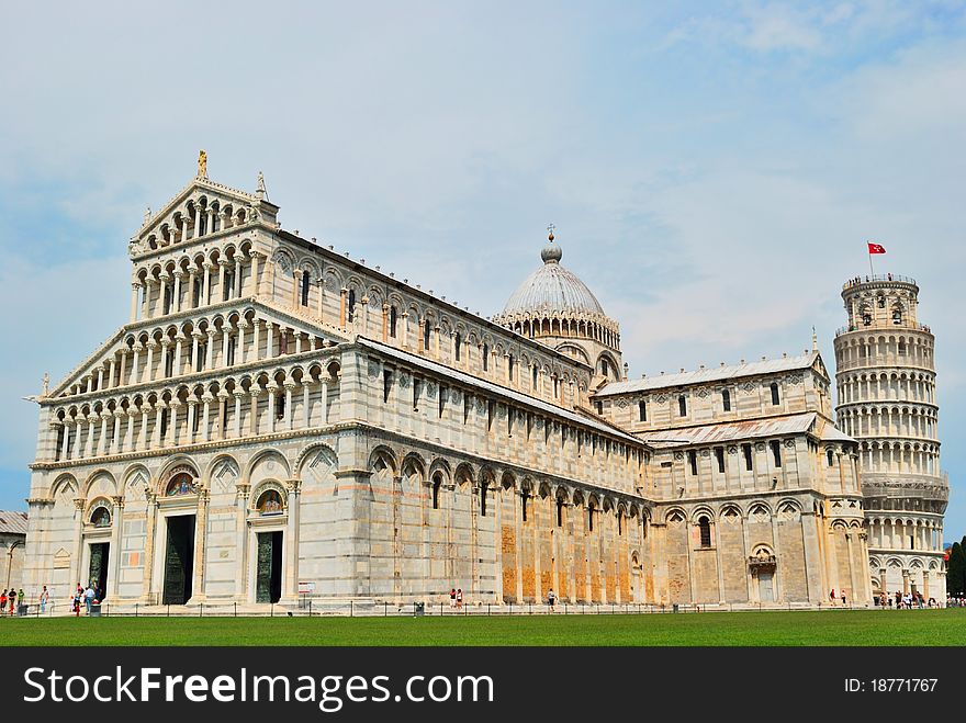 Cathedral, Baptistery and Tower of Pisa with blue sky