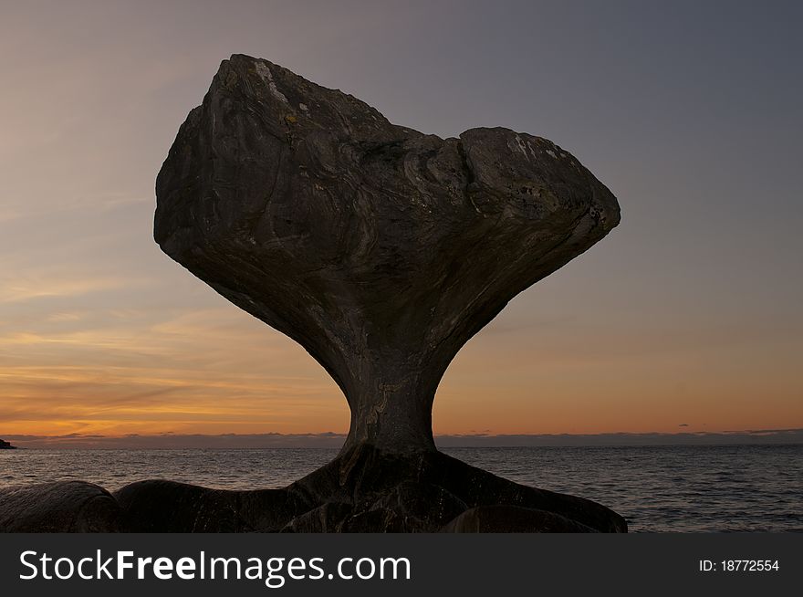 The Kannesteinen rock from Vagsoy in Norway. The Kannesteinen rock from Vagsoy in Norway