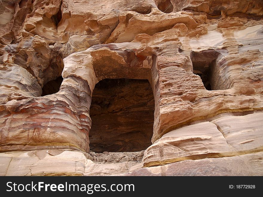 One of the many houses in the rock at Petra, Jordan. One of the many houses in the rock at Petra, Jordan