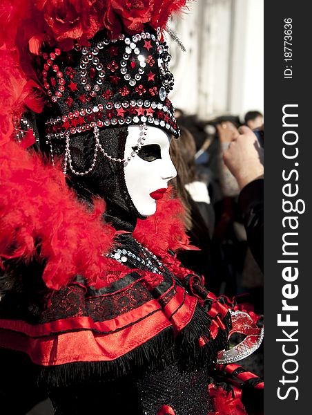 Carnival figure mask in St.MarkÂ´s Square in Venice Italy. Carnival figure mask in St.MarkÂ´s Square in Venice Italy