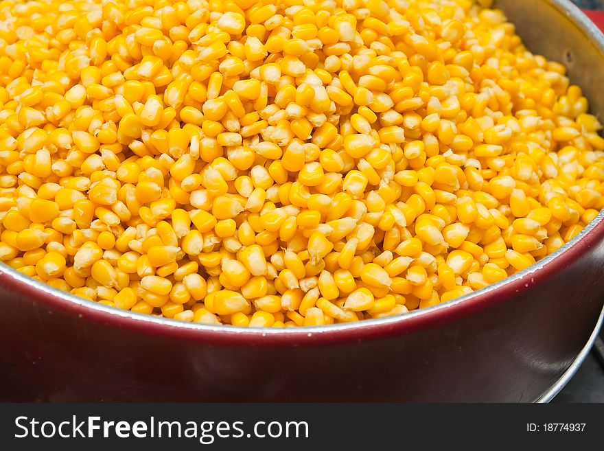 Close up of the corn seeds in the pot for background