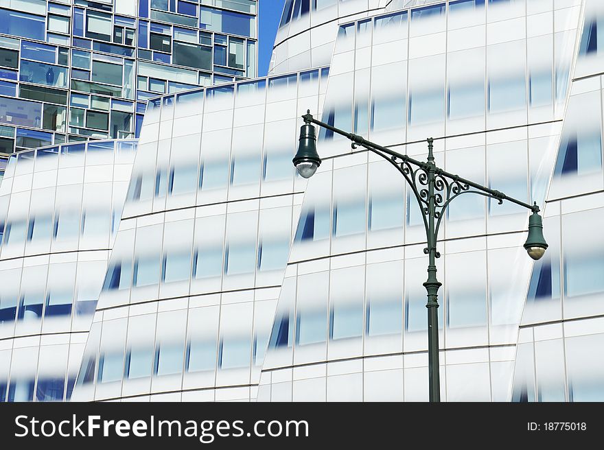 Modern architecture with old style street light. Modern architecture with old style street light