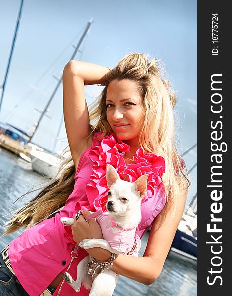 Young Pretty Beautiful Woman Holding Little Toy Terrier Dog