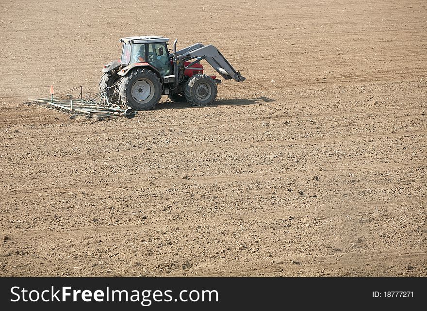 Tractor sown in the field. Tractor sown in the field