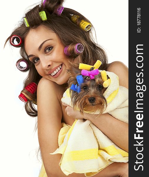 Shot of young adult female with Yorkshire Terrier dog