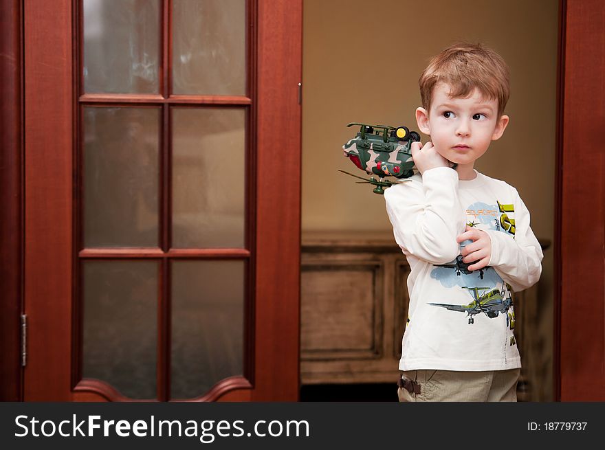 Little Boy With Toy Helicopter