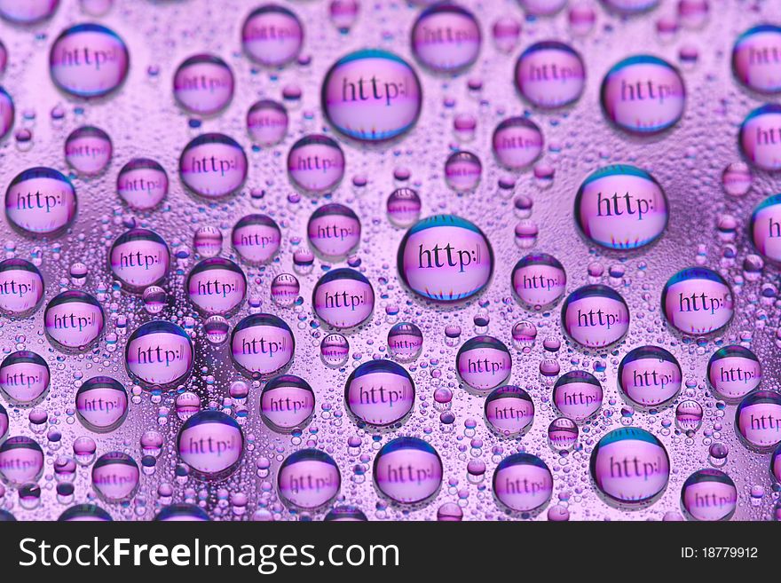 The words http:// reflected in the drops of water. Close-up of water droplets placed on a DVD disc. The words http:// reflected in the drops of water. Close-up of water droplets placed on a DVD disc.