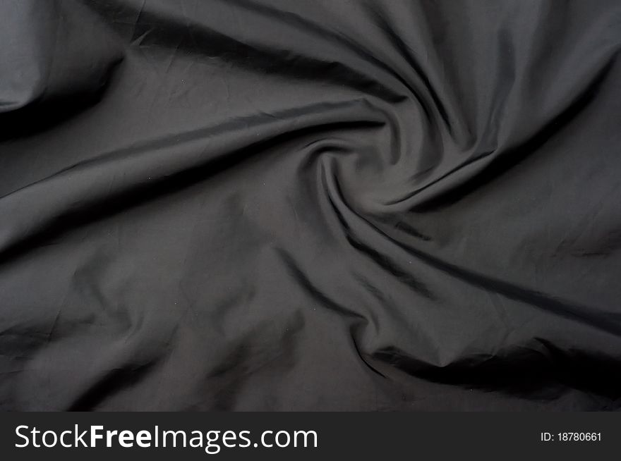 Black satin background. abstract texture