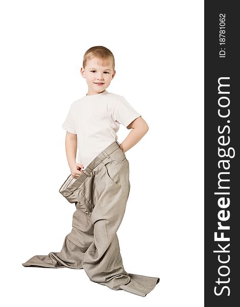 This photograph shows a boy in father's trousers