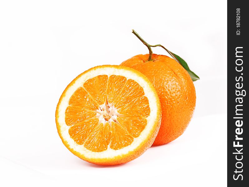 One oranges and half juicy half oranges