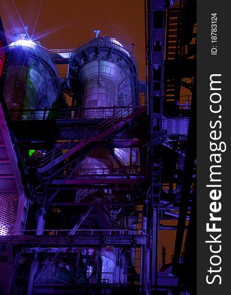 Illuminated and abaondoned steel factory by night. Illuminated and abaondoned steel factory by night