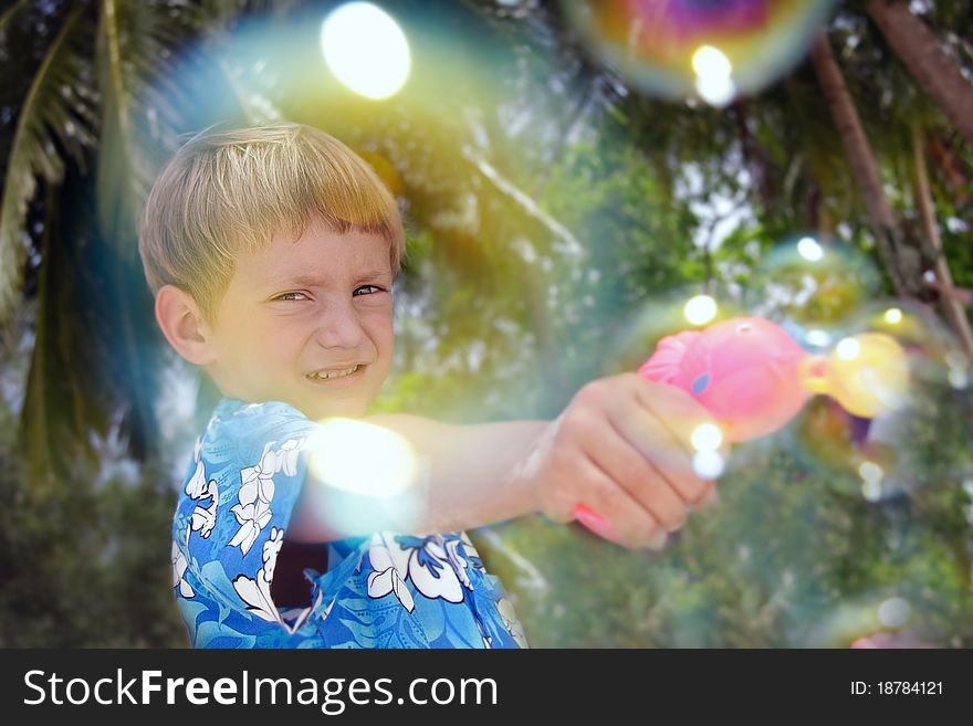 Boy Playing With Bubbles