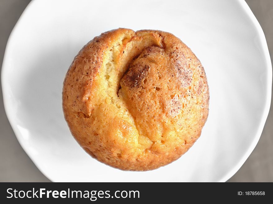 Muffin on a white plate