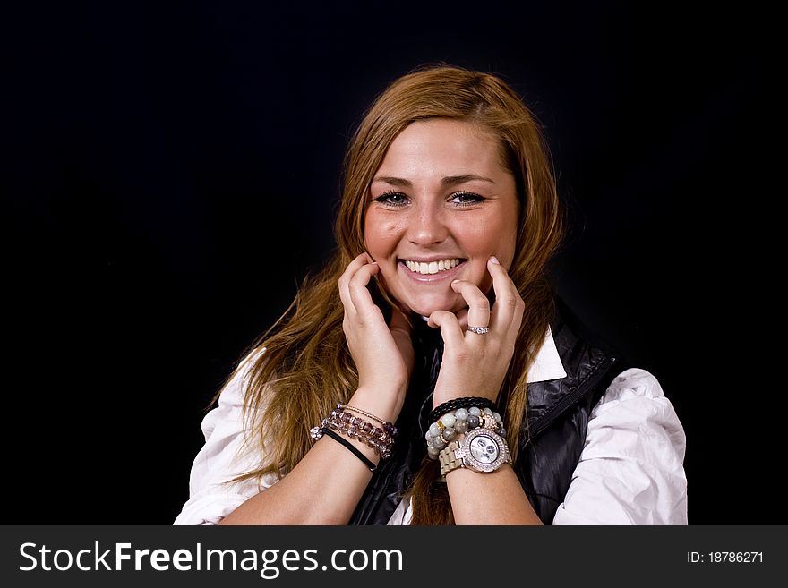 Young danish scandinavian woman with beautiful long brown hair and green/grey eyes, on black studio background. Young danish scandinavian woman with beautiful long brown hair and green/grey eyes, on black studio background.