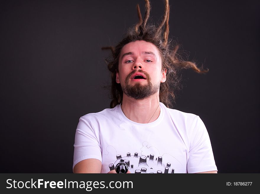 Gay guy with long dreadlocks Posing