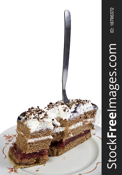 Baked black forest cake with fork isolated on white background. Baked black forest cake with fork isolated on white background.