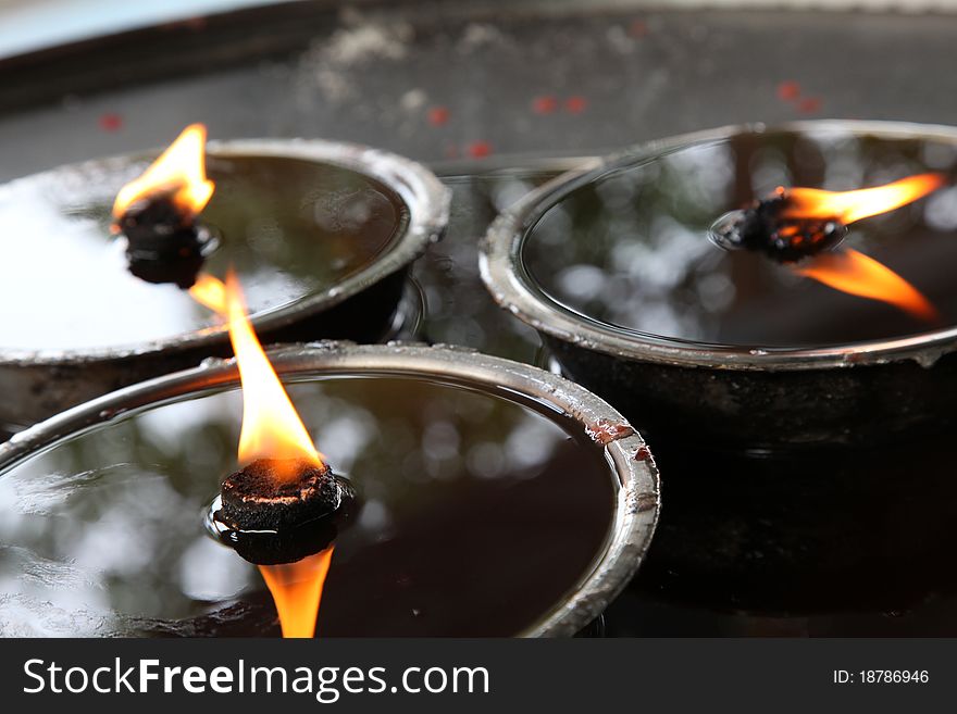 Thai temple oil lamps for Buddhism to light the cradle. Thailand