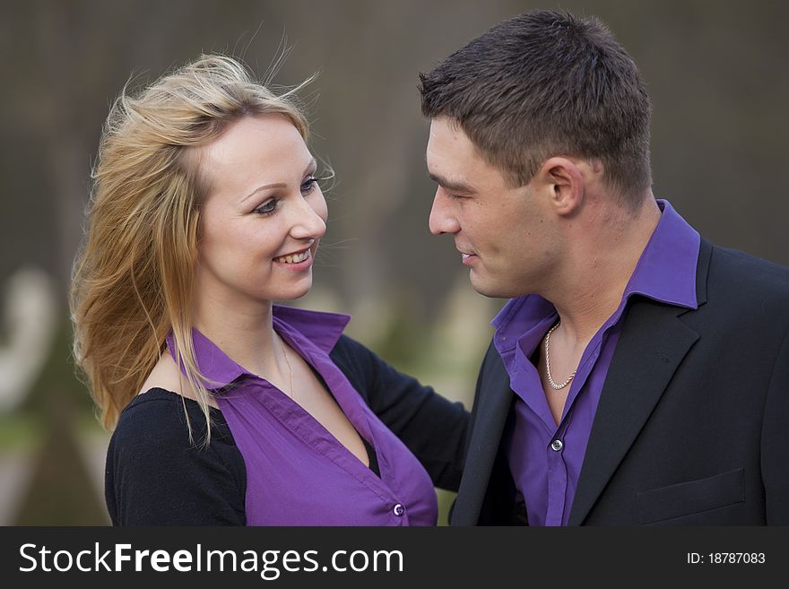 Happy and laughing couple in a park