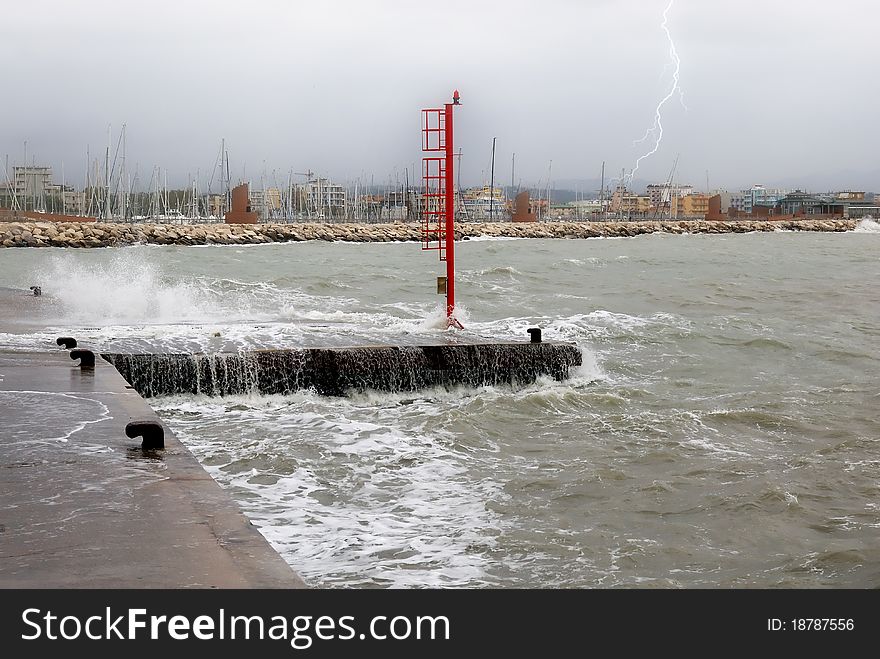 Pier submerged by water and big waves