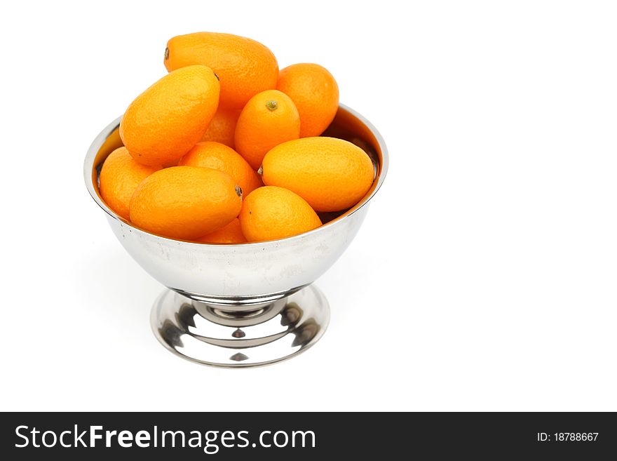 Kumquat close up isolated on white