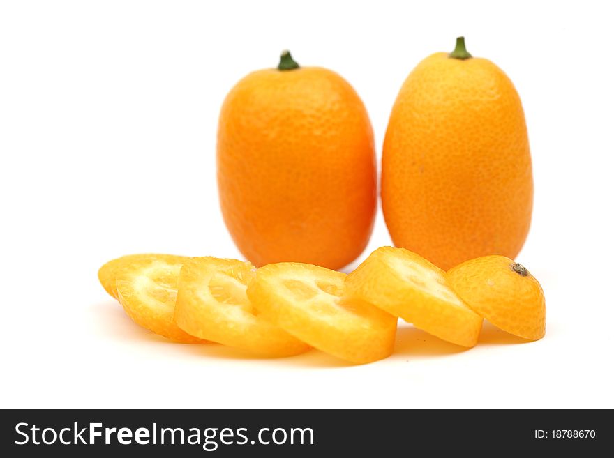 Kumquat close up isolated on white