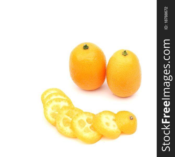 Kumquat close up isolated on white