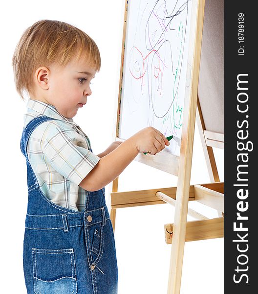 A boy is drawing on a blackboard. Isolated on a white background