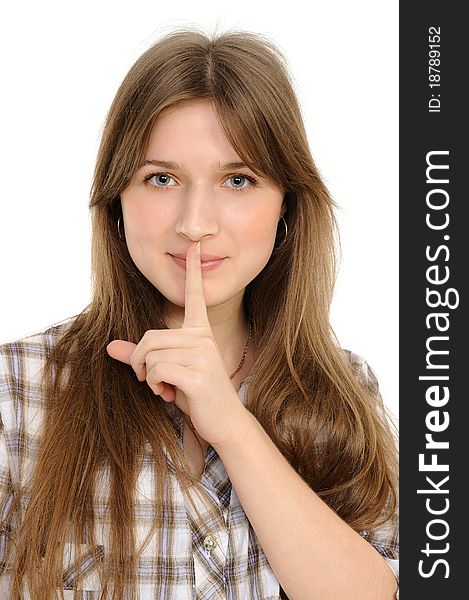 Young woman says ssshhh to maintain silence on a white background