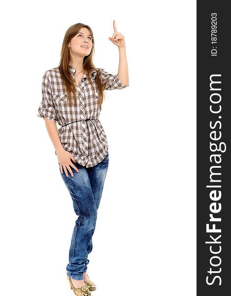 Young woman showing on something by a finger - isolated on a white background