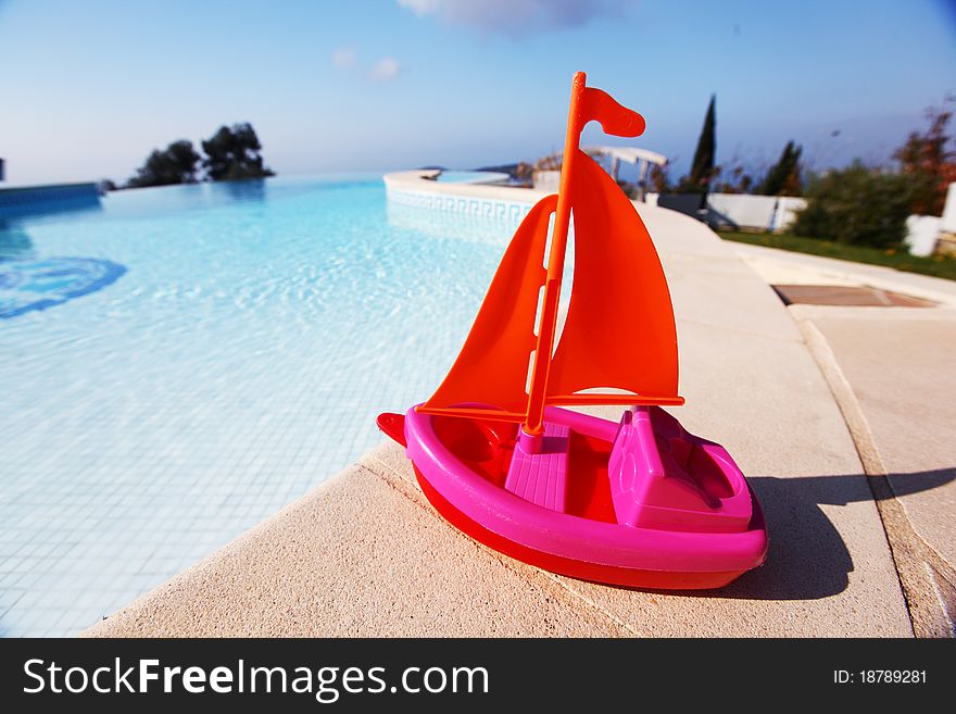 Toy ship in swimming pool. Toy ship in swimming pool