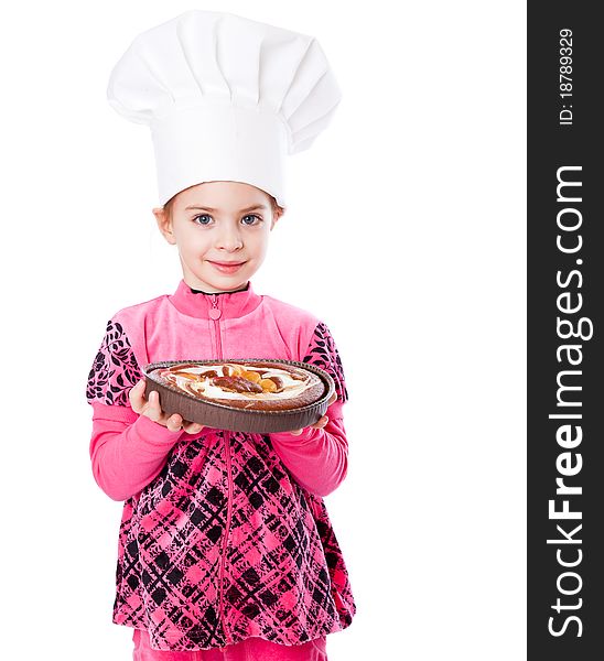 A little girl is holding a plate of pie. Isolated on a white background