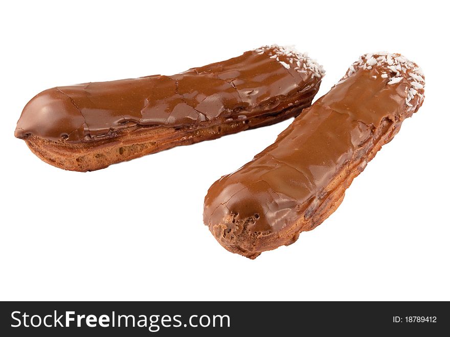Two chocolate eclairs isolated on a white background