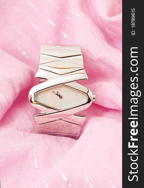 Watch on a pink background