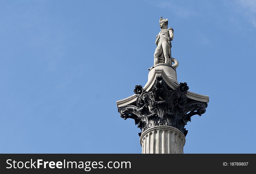 Lord Horatio Nelson looks over London from the top of nelsons column in Trafalgar square.