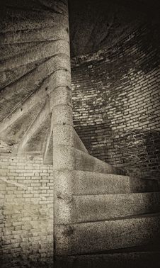Spiral Stone Steps And Brick Wall Royalty Free Stock Image
