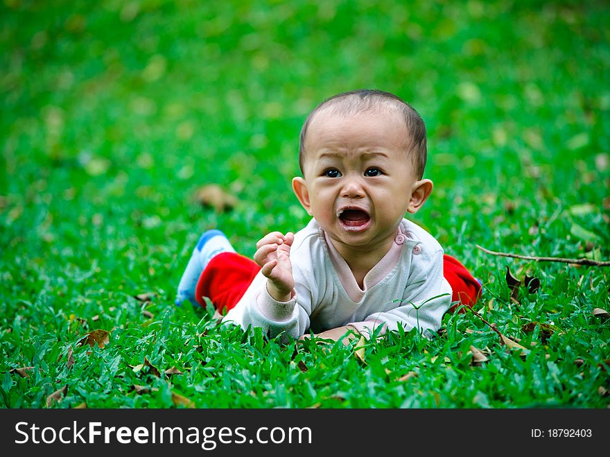 Baby boy is crying after feeding time. Baby boy is crying after feeding time