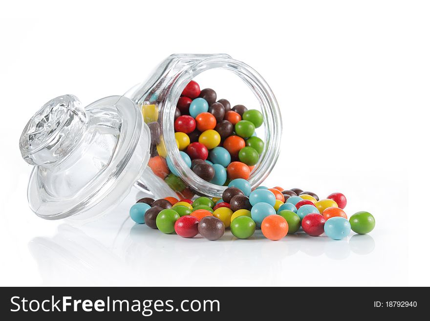Colorful candies over white background